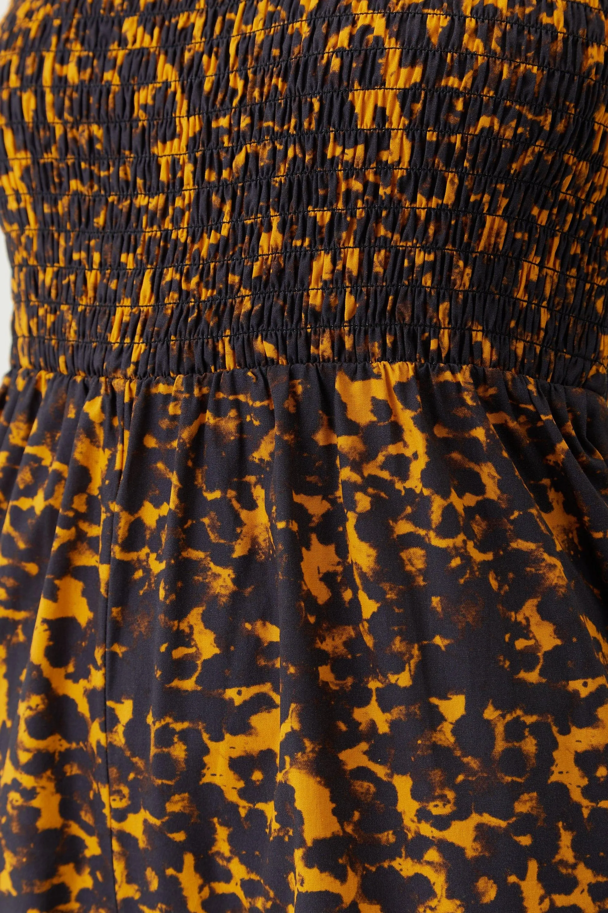 BLUR OUT SHIRRED STRAPLESS JUMPSUIT | ORANGE BLUR