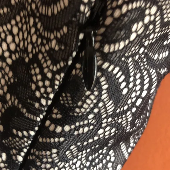 EXPRESS A line sleeveless tan and black floral laced design midi dress size L.