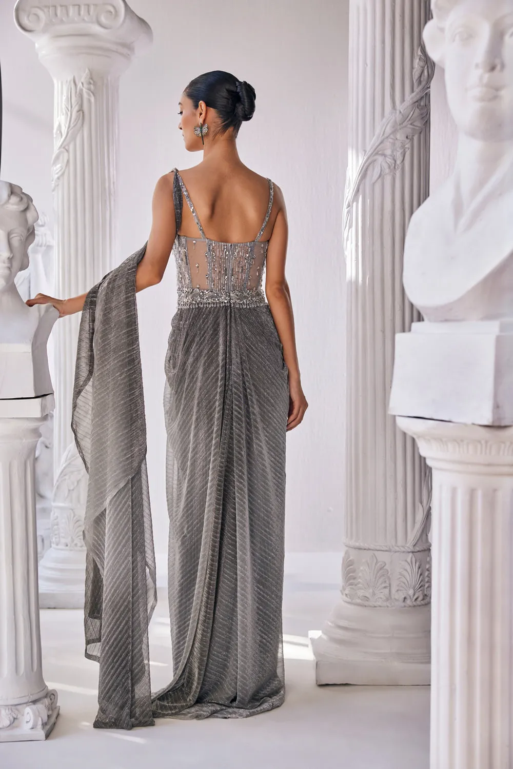 Ombre Draped Saree Gown In A Metallic Crinkle Fabric. It Is Constructed Witha Fitted Corset Bodice In Sequin And Beadwork.