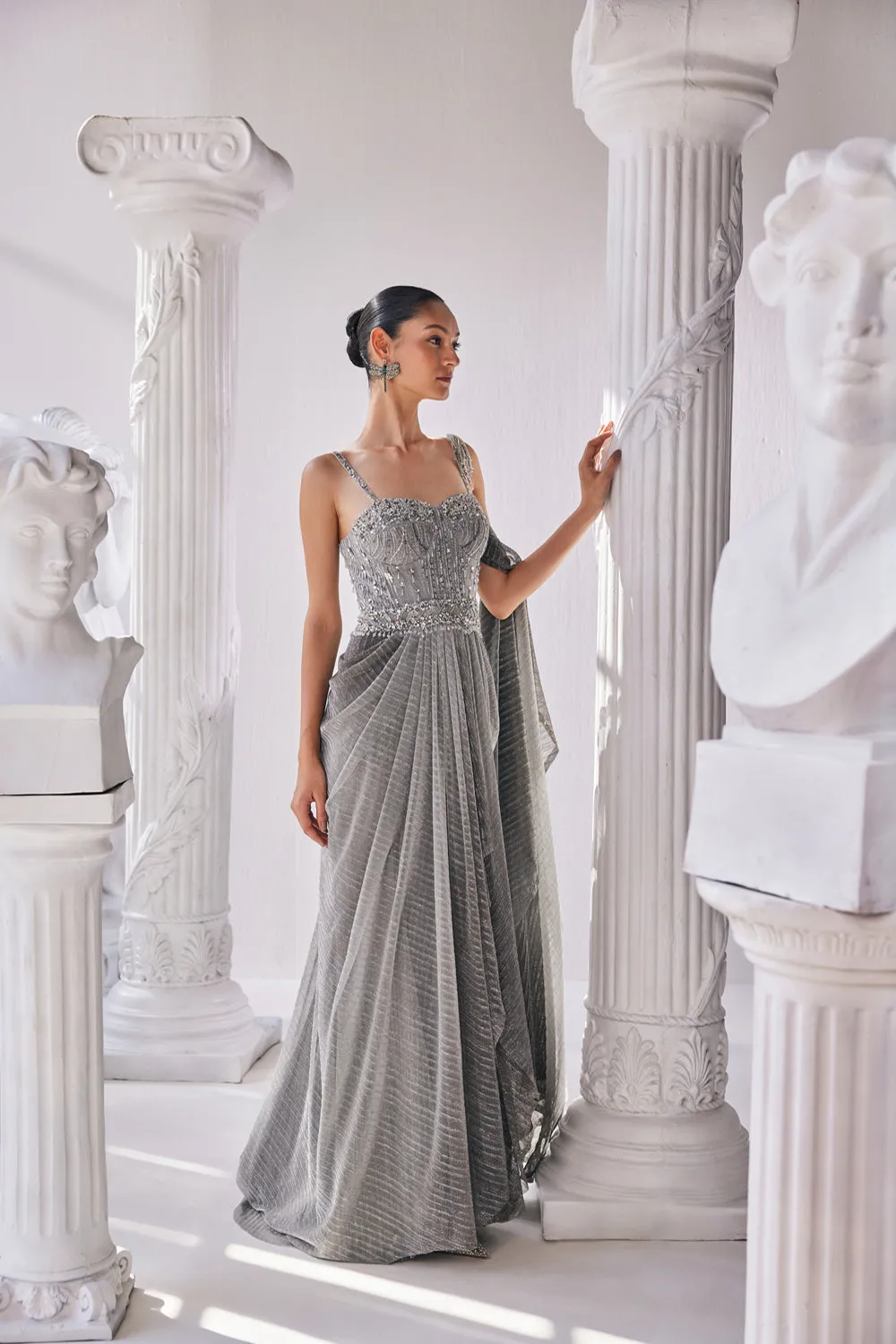 Ombre Draped Saree Gown In A Metallic Crinkle Fabric. It Is Constructed Witha Fitted Corset Bodice In Sequin And Beadwork.